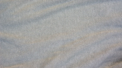Fototapeta na wymiar Close up of gray soft fabric for a background.