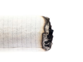 Burning cigarette on white background, macro shot
