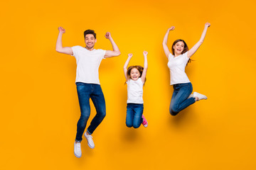 Full length body size view of three nice attractive slim sporty lovely cheerful cheery person having fun rejoicing attainment success accomplishment isolated over bright vivid shine yellow background