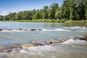 Longtime Exposure of River with River Steps and River Bank in Munich, Bavaria, Germany, Europe