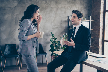 Photo of two business people having coffee break standing workstation communicating dressed formal wear suits