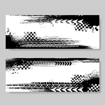 Two white banners with black grunge elements and tire tracks