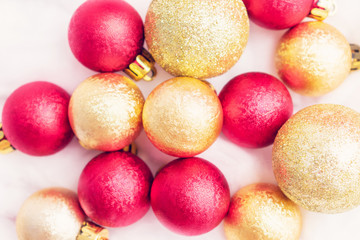 Christmas toys on a background of white snow made of cotton, for advertising, close up