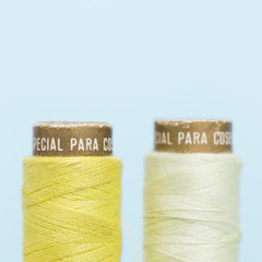 Pair of yellow thread reals