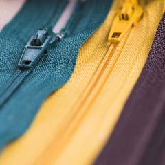 Line of three different zips