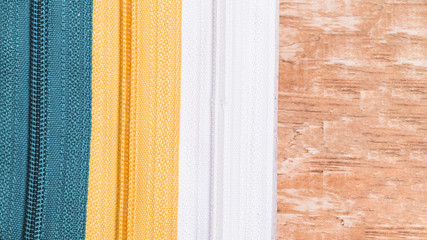 Line of three different zips
