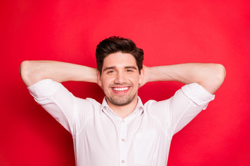 Close-up portrait of his he nice attractive lovely cheerful cheery peaceful guy enjoying free spare time harmony comfort idyllic weekend isolated over bright vivid shine red background