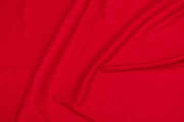 Red crumpled blanket, texture, top view