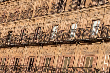 Detail balconies of the plaza mayor, built between 1729 to 1756, in baroque style, designed by architect Alberto Churriguera, taken in Salamanca, August 18, 2019