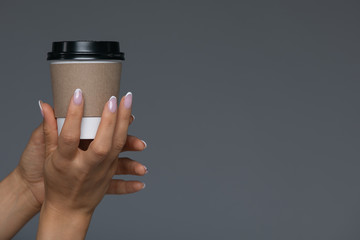 Take Away White Paper Hot Coffee Cup With Right Hand Holding.
