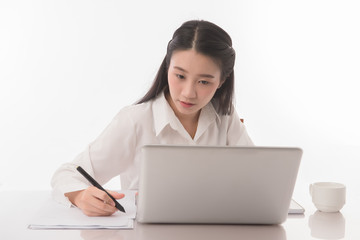 Portrait of business asian woman working on desk  on white background.