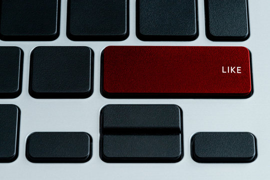 Like Text on Laptop Keyboard Red Button. Theme of Social Media and Content Sharing Terms.