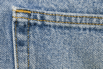 Details on blue jeans pocket close-up