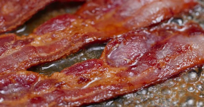 Cook with bacon on fry pan