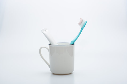 Toothbrush, Toothpaste And Cup