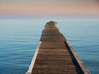 Obraz premium A jetty on the beaches of Lefkimmi in Greece