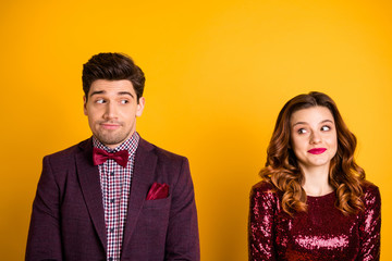 Close-up portrait of his he her she nice attractive elegant charming glamorous cheerful delicate shy people looking at each other meeting first time isolated over bright vivid shine yellow background