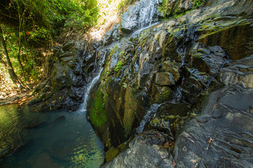 Ton Aow Yon Waterfall rich natural resources,in the forest,asia tropical areaat Island Phuket Thailand.