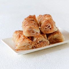 Turkish Ramadan Dessert Baklava with walnut, peanuts  and honey syrup. Middle eastern or arabic dishes. Traditional arabic dessert