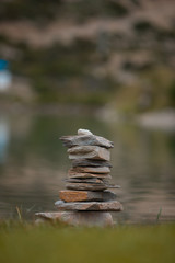  River stones remain, while water flows away.