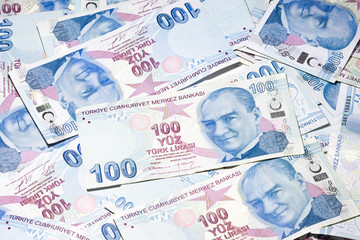 100 Turkish lira banknotes background. - obrazy, fototapety, plakaty