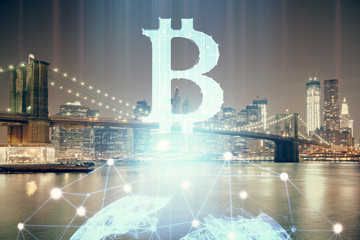 Multi exposure of cryptocurrency theme hologram drawing and city veiw background. Concept of blockchain and bitcoin.
