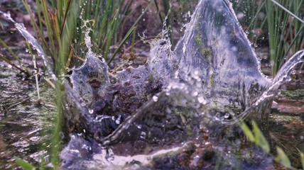 water splashing out of lake