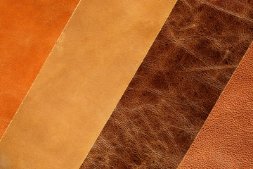 light brown or orange genuine leather texture background, genuine leather. Brightly colored skin of different types and colors. Leather craft. Top view