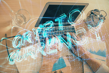 Blockchain theme hologram with man working on computer on background. Concept of crypto chain. Double exposure.