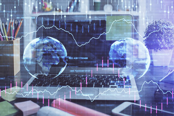 Multi exposure of chart and financial info and work space with computer background. Concept of international online trading.