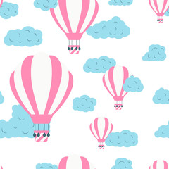 Seamless pattern with hot air balloons in the sky with clouds. Cute vector baby background. Vector wallpaper tourism concept.