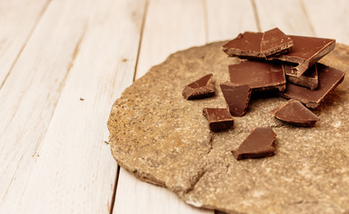dark chocolate without sugar and gluten free for diabetics and allergics. Pieces of chocolate lie...
