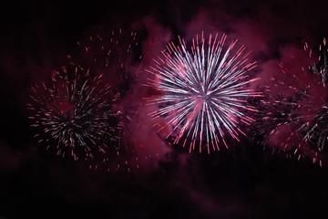 Colorful fireworks of various colors over night sky