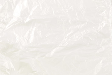 Obraz premium Cellophane bag on a blue background. Top view.