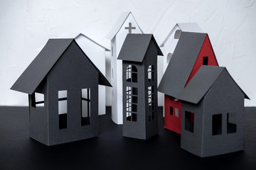 Paper City cut from a paper on dark background