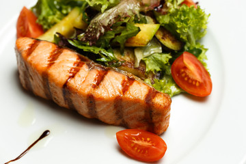 grilled salmon steak with vegetable salad