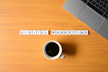 digital marketing text With pen and laptop computer,Business concept