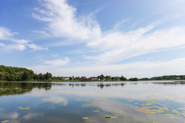 Beautiful cloudy sky and blue river
