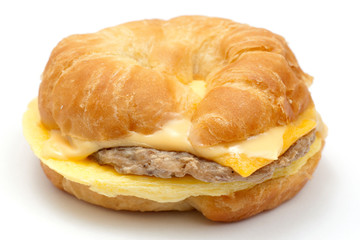 egg,sausage, and cheese croisant, isolated on white