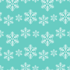 white snowflakes on a blue background vector illustration seamless pattern