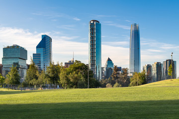 Obraz premium Skyline of buildings at Vitacura and Providencia districts from Parque Bicentenario, Santiago de Chile