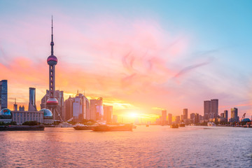 Naklejka premium Shanghai skyline and modern buildings at sunrise,China.