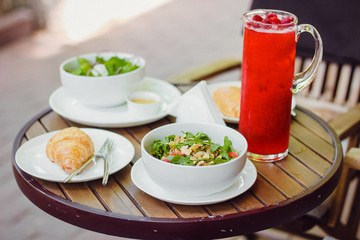 Healthy breakfast :  rocket salad with  juice