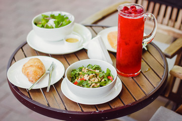 Healthy breakfast :  rocket salad with  juice