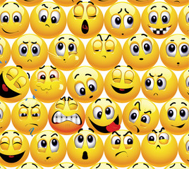 Smiling balls with different face expression stuck with each other in a group.