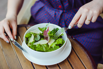 Woman eating healthy salad