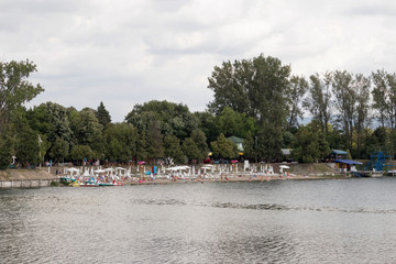 Equipped part of the beach on the lake for relaxation and swimmi