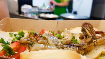 Cambodian dish grilled frog. Tasty exotic dishes are served in the restaurant. Street food frog legs