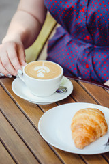 woman drinking coffee