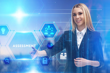 The concept of business, technology, the Internet and the network. A young entrepreneur working on a virtual screen of the future and sees the inscription: Assessment